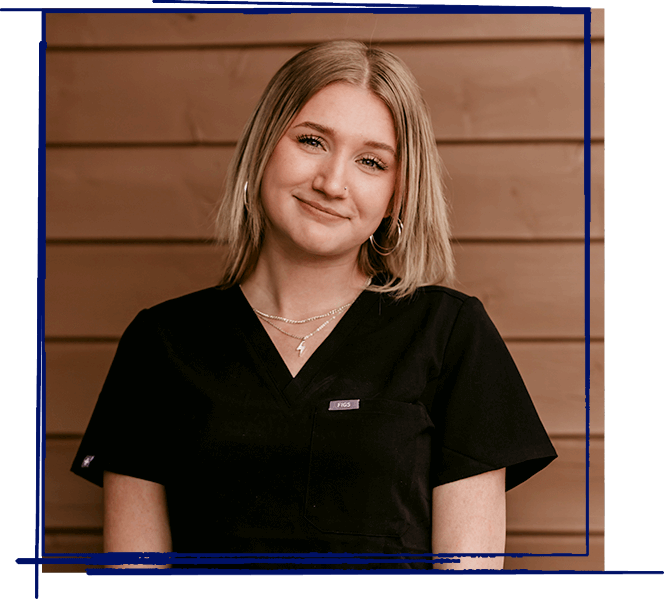 Chloe, a dental team member at West Jordan dental practice, smiles in professional portrait.